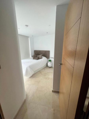 Modern central 1 bedroom apartment with rooftop spa